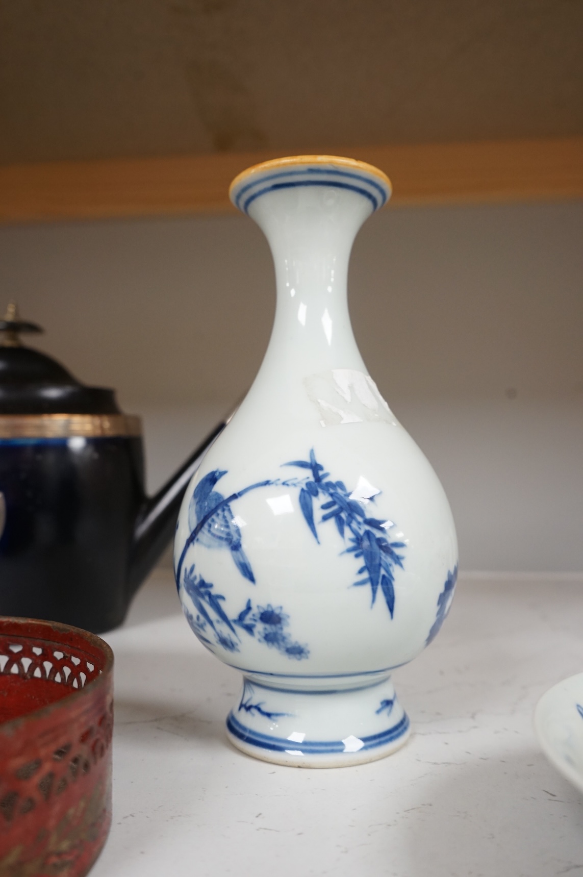 A Chinese blue and white vase and a ‘fish’ saucer dish, largest 19cm high